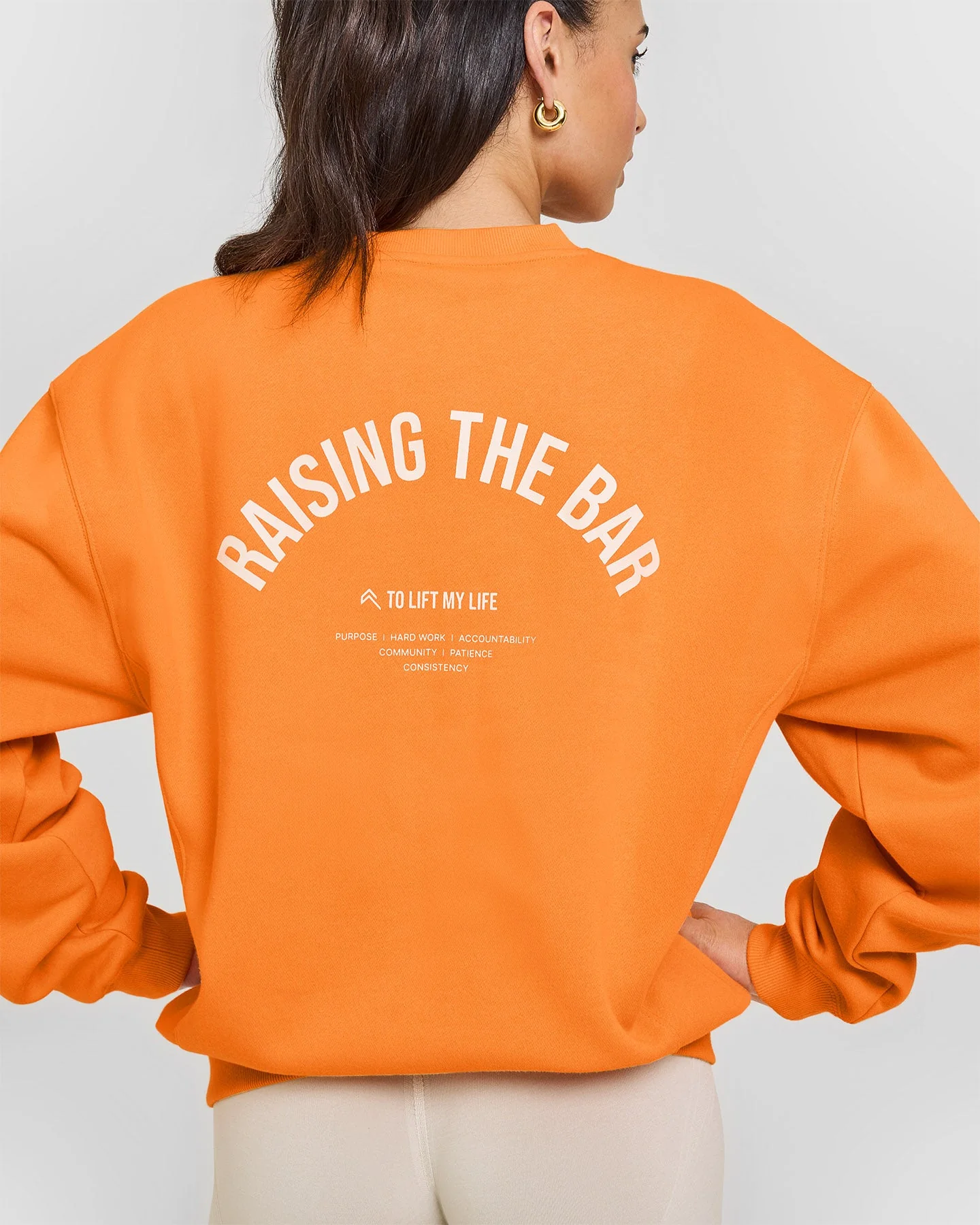 Foundations Raising the Bar Crew Neck Sweatshirt | Apricot Orange - Image 6
